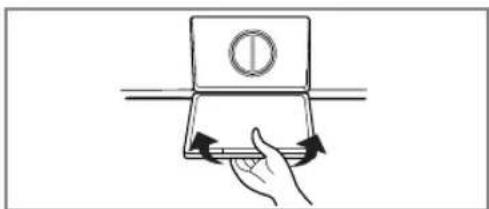 Hand holding a laptop with directional arrows indicating motion.