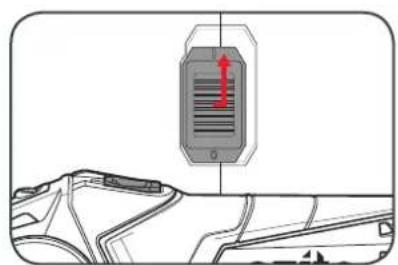 Diagram showing a device with red directional arrow pointing to a barcode-like symbol, above a vehicle silhouette.