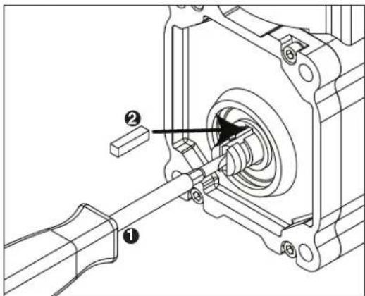 Technical diagram of a mechanical assembly with labeled parts ① and ②, showing a shaft and housing mechanism.