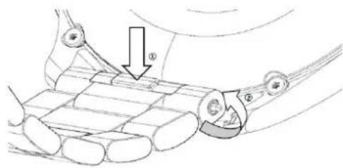 Diagram showing a mechanical or robotic assembly with labeled parts and directional arrow, likely illustrating a process or operation.