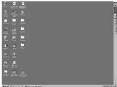 Screenshot of a classic Windows desktop with application icons and system tray visible