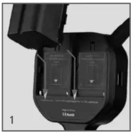 Close-up of a black electronic device with internal components and control buttons (no readable text or symbols)