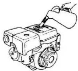 Line drawing of a mechanical assembly with a hand holding a tool (no text or symbols)