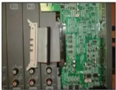 Close-up of a green printed circuit board with multiple ports and connectors (no visible text or symbols)