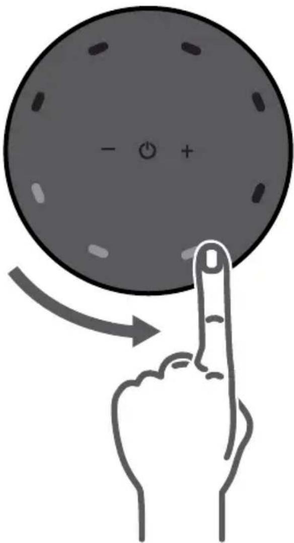 Diagram showing a hand pressing a button on a circular device with polarity indicators and an arrow indicating motion direction.