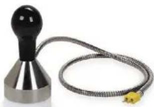 Close-up of a metallic mechanical device with a coiled cable and a black handle (no text or symbols visible)