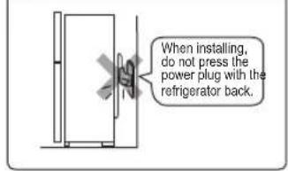 When installing, do not press the power plug with the refrigerator back.