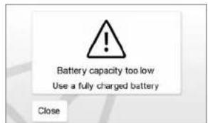 Battery capacity too low Use a fully charged battery Close