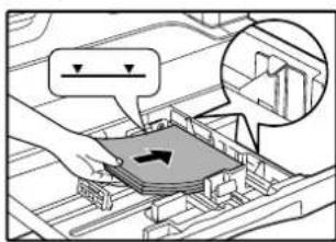 Diagram showing a hand pressing down a component with directional arrows and a magnified inset highlighting a specific area.