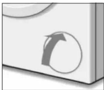 Close-up of a white rectangular object with a circular arrow symbol on its side (no text or symbols present)