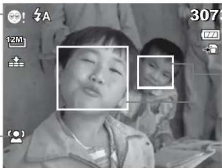 Black-and-white photo of a smiling child in a bedroom, with another child holding a baby (no visible text or symbols)