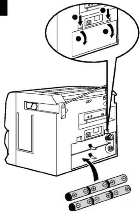 Diagram showing a device with labeled components and directional arrows indicating movement or operation, including battery terminals.