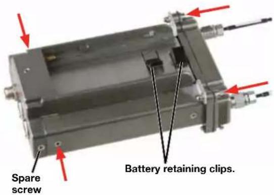 Spare screw Battery retaining clips.