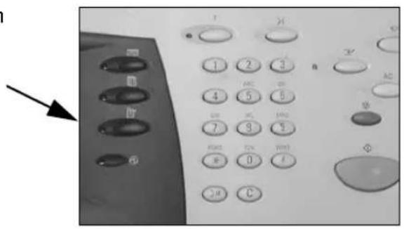 Close-up of a vintage computer control panel with labeled buttons and an arrow pointing to the left button.