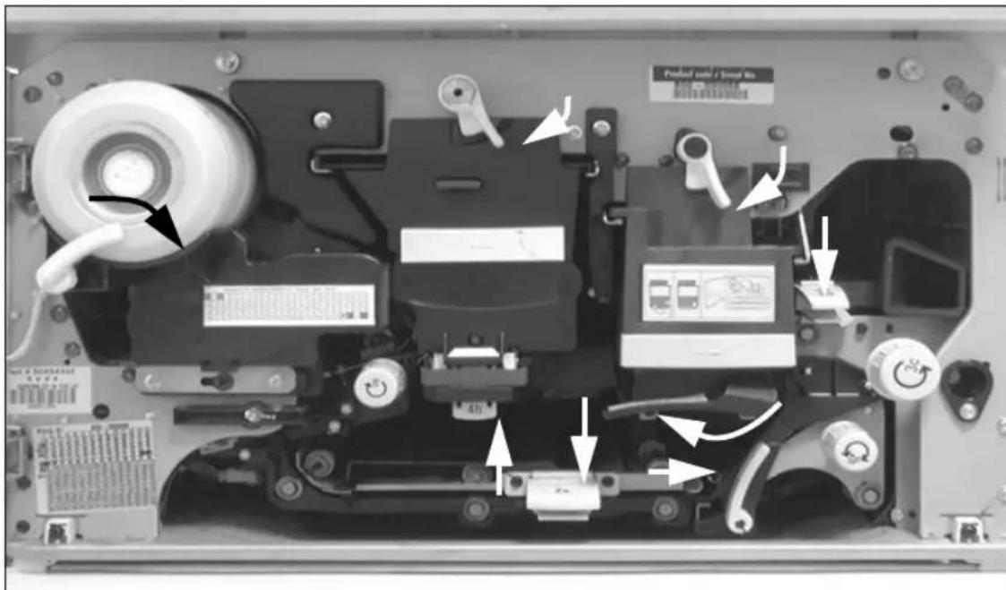 Internal view of a printer's internal components with labeled parts and directional arrows indicating assembly or movement.