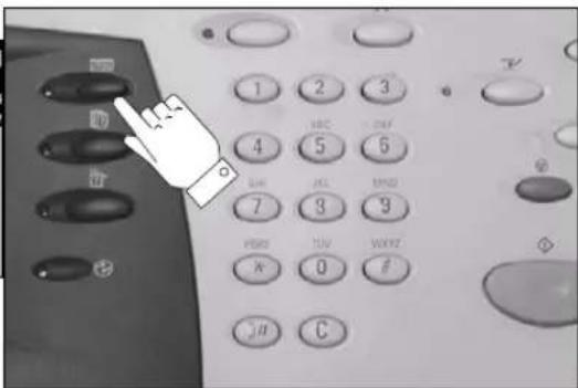 Close-up of a hand pointing to a numeric keypad with labeled buttons and numbers, likely from an electronic device interface.