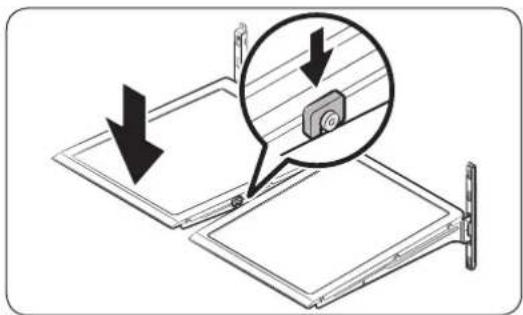 Diagram showing a device being inserted into a panel, with arrows indicating direction and magnified detail highlighting the component.