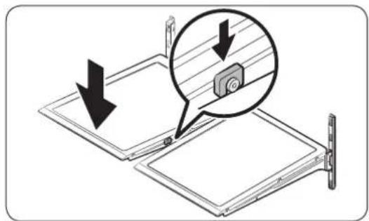 Diagram showing a device with arrows indicating movement or force, and a magnified inset highlighting a component.