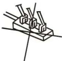 Simple line drawing of a mechanical component with three pins and intersecting lines (no text or symbols)