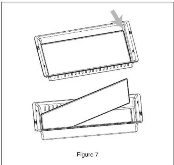 Technical line drawing of two rectangular electronic components, one with a downward arrow indicating compression or disassembly.