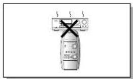 Diagram showing a fire extinguisher with a cross mark and warning symbol, likely indicating a hazard or explosion.