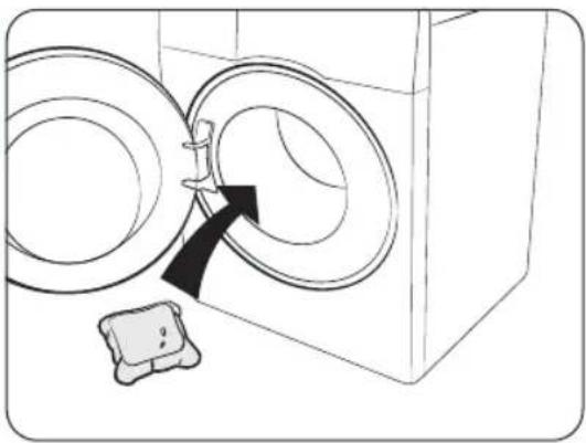 Line drawing of a washing machine with two circular doors and a small device on the floor (no text or symbols)