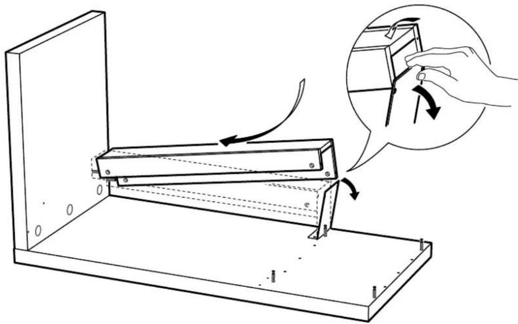 Technical diagram showing a mechanical device with directional arrows and an inset hand holding a tool, illustrating a process or operation.
