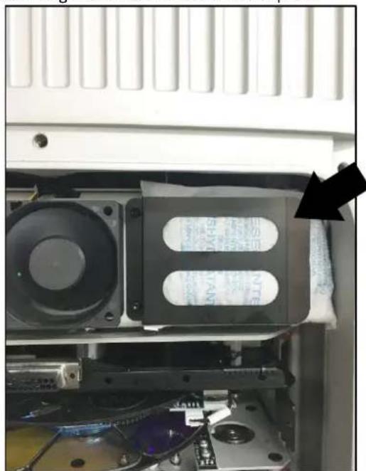 Interior view of an electronic device showing a speaker, drive unit, and circuit board (no visible text or symbols)