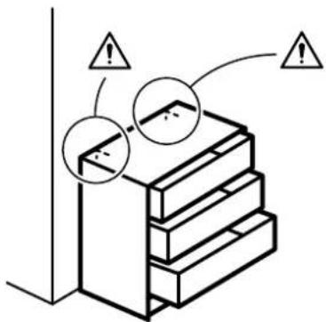 Diagram showing a stack of books with warning symbols and arrows indicating safety or hazard.