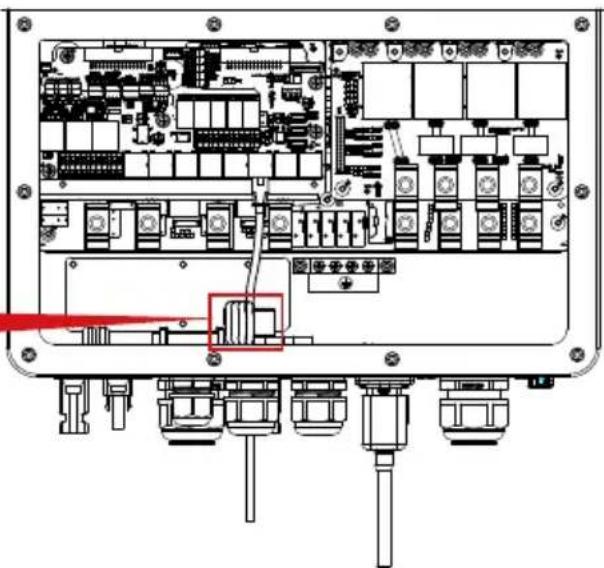 Interior view of an electronic device module with visible circuitry and connectors (no text or labels)
