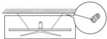 Diagram showing a mechanical setup with a lever and a magnified inset of a component (no text or symbols)