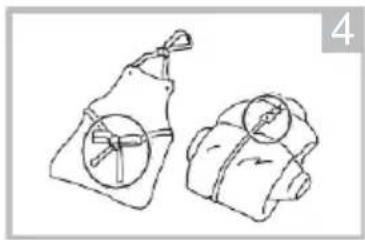 Two handbags with circular cutouts, one wrapped in a blanket and the other in a bag (no text or symbols)