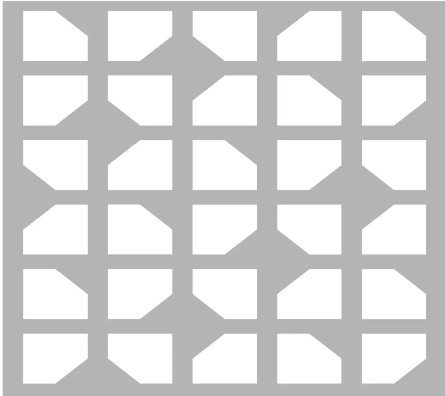 Abstract geometric pattern composed of white polygons on a gray background (no text or symbols)