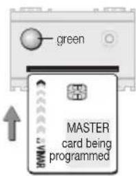 green MASTER card being programmed