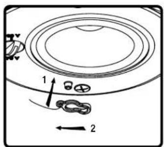 Diagram showing a circular device with labeled components and directional arrows, likely illustrating a mechanical or electrical system.