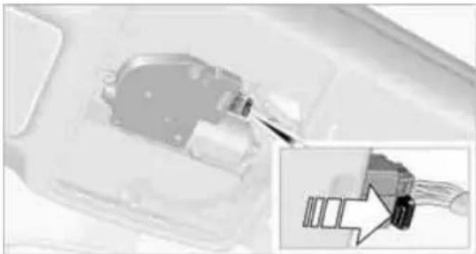 Close-up of a mechanical component with an inset showing a close-up of a connector detail (no visible text or symbols)