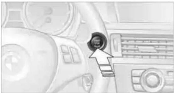 Illustration of a car dashboard with a camera and keyboard, no visible text or symbols