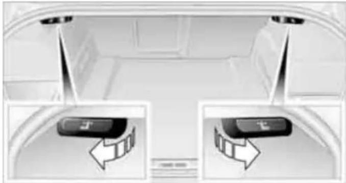 Interior view of a car trunk with two directional control buttons and arrows indicating movement (no text or symbols)
