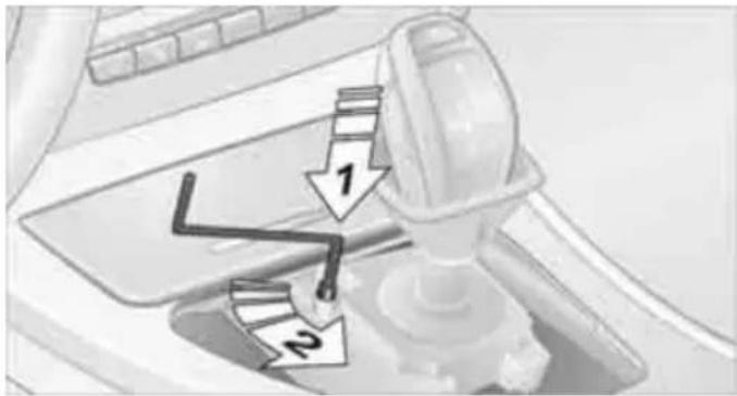 Diagram showing a mechanical device with labeled parts and directional arrows, likely illustrating a motion or control mechanism.