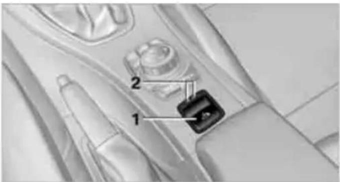 Technical diagram showing a mechanical component with labeled parts 1 and 2, likely for assembly or inspection.