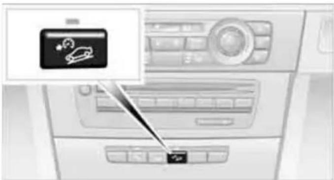 Interior view of a car air conditioner unit showing the control panel and ambient controls (no text or symbols visible)