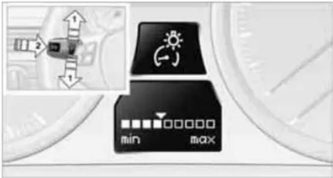 Car dashboard control panel with icons for minimum and maximum settings, showing vehicle status indicators