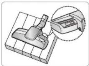 3D mechanical assembly diagram showing a lever and base plate with an inset close-up of the component (no text or symbols)