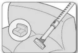 Medical illustration showing a syringe inserted into a box, with an inset magnified view of the same object (no text or symbols present)