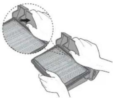 Illustration of hands holding a grid-based device with a magnified inset showing a folded paper edge (no text or symbols)