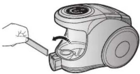 Illustration of a hand using a tool to clean or adjust a vacuum cleaner's air gap (no text or symbols present)