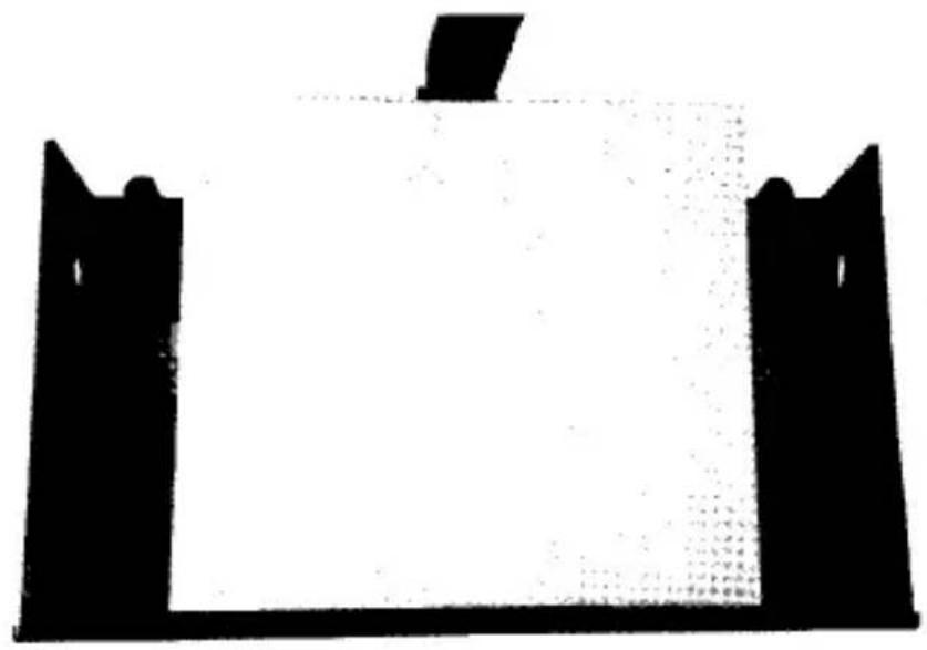 Simple black-and-white diagram of a rectangular structure with two vertical openings and a central triangular top (no text or symbols)
