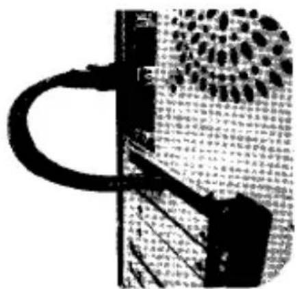 Scanned document with dense text and a large circular seal-like graphic on the left side.