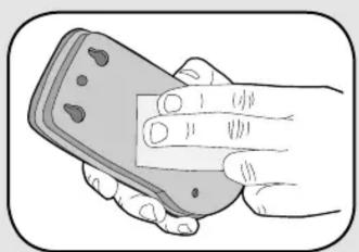 Illustration of a hand holding a small object with holes, no text or symbols present