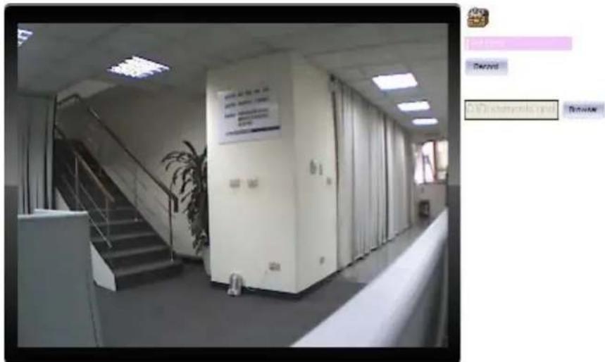 Black-and-white photo of an office hallway with visible signage and a software interface panel showing text.